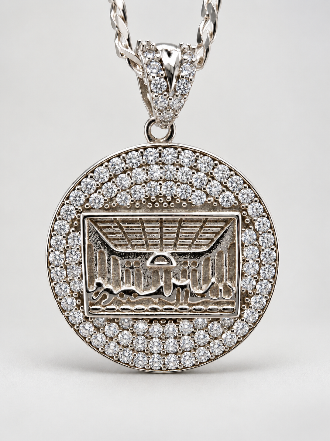 Sterling silver Last Supper pendant with a round clear-stone border and stone-accented bail