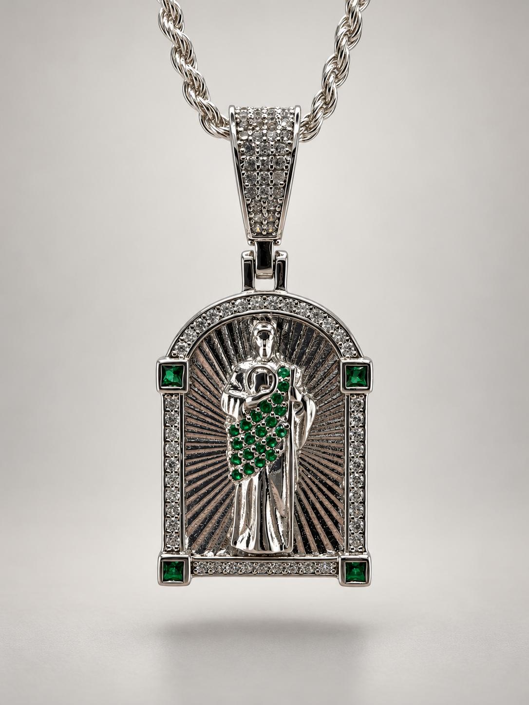Arched Saint Jude Thaddeus sterling silver pendant with green stone accents, clear-stone border, and radiating background